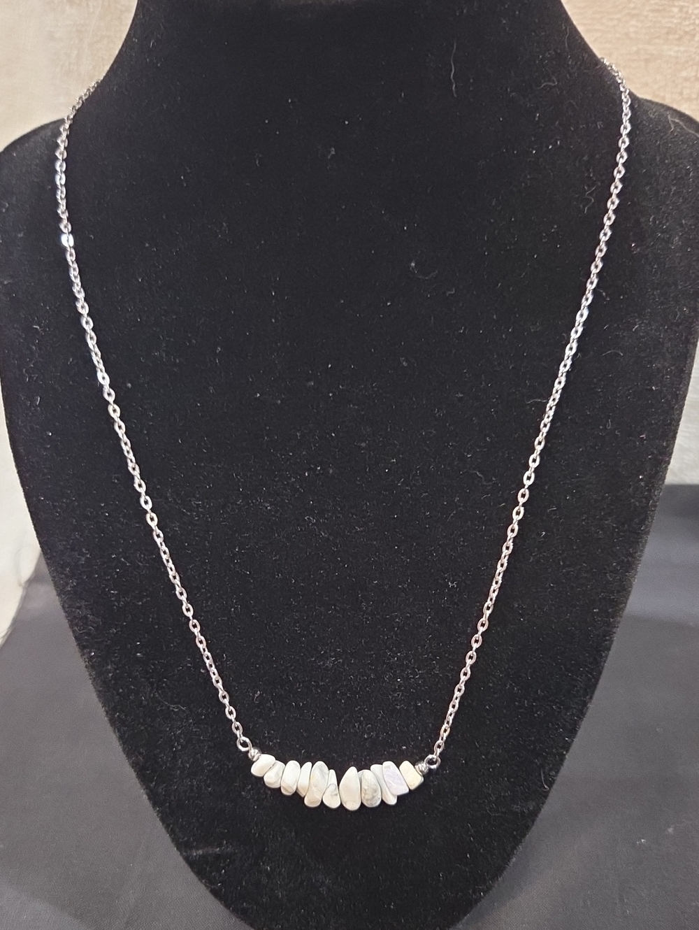 SILVER-TONE CHAIN WITH HOWLITE CHIP STONES